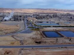 AERIAL ZI  DS View of negev industries with evaporation ponds / Negev, Israel Stock Footage