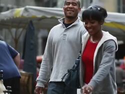 young couple shopping in a European outdoor market Stock Footage