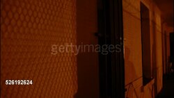 burglar with gun and house break-in Stock Footage