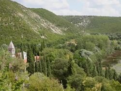 Krka river and the monastery of the Holy Archangel, Carigradska draga, Krka National Park  Stock Footage