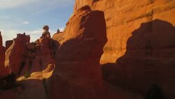 Fly through arch and rise above tower Stock Footage