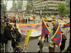 Prayer vigil marks first anniversary of anti-China riots News Clip