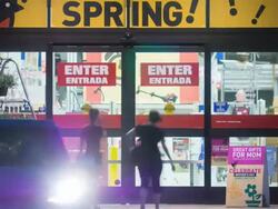 T/L  sliding doors at big box hardware store with bilingual signs  as shoppers enter and exit store / La Quinta, California, USA Stock Footage