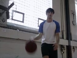 MS young man playing basketball and practicing inside  gymnasium  / Minneapolis, Minnesota, United States  Stock Footage