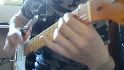 Boy playing guitar close up Stock Footage