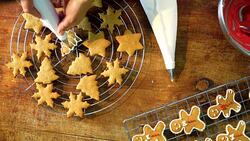 Decorating Christmas Cookies with Icing Stock Footage