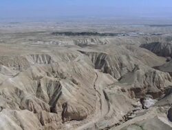 Aerial northern Judea Desert and Kibbutz Almog, Israel, Northern Judea Desert Stock Footage