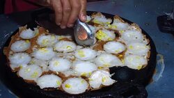 Cooking Thai dessert , Coconut milk mix with powder fried dessert. Stock Footage