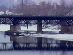 MS PAN Geeses flying and bay with rail bridge / Minneapolis, Minnesota, United States Stock Footage