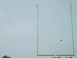 WS, LA, American football ball flying over goal, Staten Island, New York, USA Stock Footage