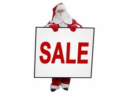 Santa Claus holds "SALE" sign - 3 shots Stock Footage