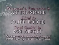 Green Islands, 1954, part 1 - London street scenes, traffic, school gates, mother with pram Stock Footage