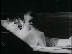 Elizabeth, Philip and baby Prince Charles Stock Footage