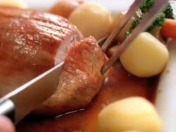 baked meat knife cuts. cuchillo corta carne al horno Stock Footage