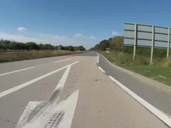 Travelling on a dual carriageway looking backwards Stock Footage