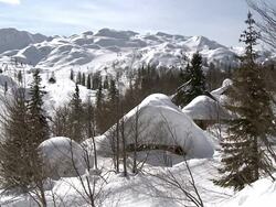 MS Ski fields and lifts on snow covering slopes / Bohinj, Triglav, Slovenia Stock Footage