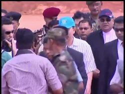 UN Secretary-General Ban Ki-moon flew over Sri Lanka's last battlefield and urged the government to let more aid reach displaced Tamils complaining of hunger and separation from their families. News Clip