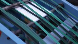Machine producing folders in the printing plant Stock Footage