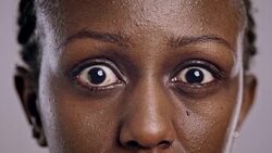 Eyes of an angry African-American woman Stock Footage