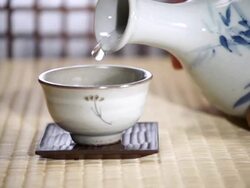 CU SLO MO Shot of Pouring Sake into cup / Seoul, South Korea Stock Footage