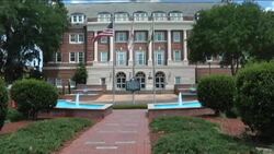 The director of Florida A&amp;M University's famed marching band is retiring, while a top state official urged the university to keep the band suspended following drum major Robert Champion's death. News Clip