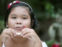 Fat girl eating Stock Footage