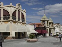 WS View of of People walking at beach promenade with Art Nouveau houses / Viareggio, Tuscany, Italy Stock Footage