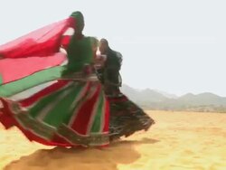 Two women dancing in the desert, Rajasthan, India Stock Footage
