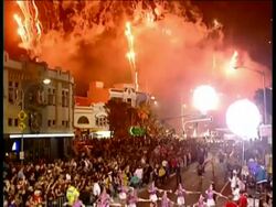 WA Street parade at Sydney Gay & Lesbian Mardi Gras, Fireworks overhead Stock Footage