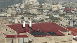 Erfat settlement apartment blocks and roads News Clip