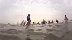 Thousands in their bathing suits jump into the frigid waters of the Atlantic at New York's Coney Island News Clip