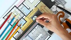 Designerï¿½s hand working with home floor plan Stock Footage