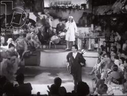 Juan-les-Pins 1952 - cabaret at nightclub, exercise bike competition, can-can dancers and ballroom dancing Stock Footage
