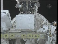 WRAP Discovery astronauts on spacewalk, working on boom News Clip