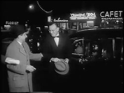 B/W 1955 Benny Goodman + women exiting limo at premiere of "The Benny Goodman Story" / newsreel Stock Footage