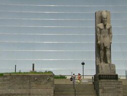 WS Family descend  stairs next to statue of ramesses great at pyramid arena / Memphis, Tennessee, United States Stock Footage