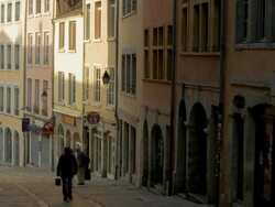 Pentes de la Croix-Rousse,Lyon,Men walking down hill,MS Stock Footage