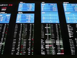 MS Stock board with flashing lights / Kabuto-cho, Tokyo, Japan Stock Footage