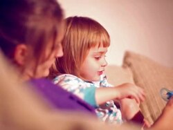 mother gives the child a pacifier Stock Footage
