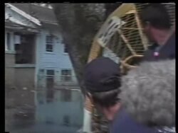 Search for survivors still standed in floodwater News Clip