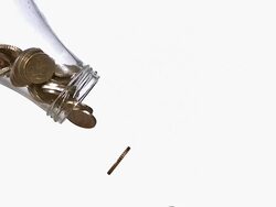 CU SLO MO Euro Coins Falling down through Bottle / Vieux Pont, Normandy, France Stock Footage