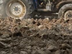 HD : tractor plowing the soil for cultivation Stock Footage