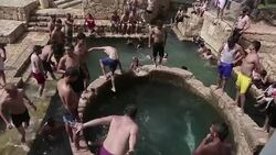 CLEAN : Palestinians and Israelis cool off in WB natural spring News Clip