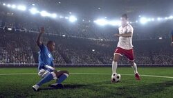 Soccer player kicking ball in stadium Stock Footage