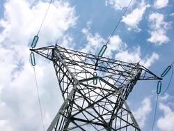 Electrical tower with cloudscape Stock Footage