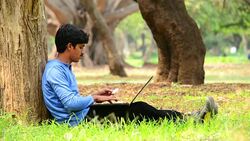 Young Indian Man Purchasing Online Using Credit Card Stock Footage