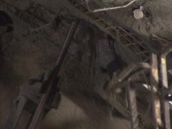 LA MS drilling hole into ceiling at construction site/ Slovenia Stock Footage