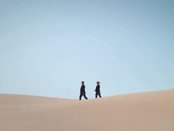Businesspeople in desert Stock Footage