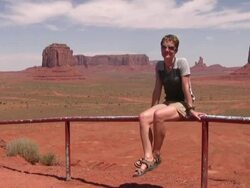 HD: Posing by Monument Valley Stock Footage