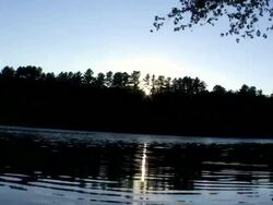 A timelapse shot of the sunset over a river. Stock Footage